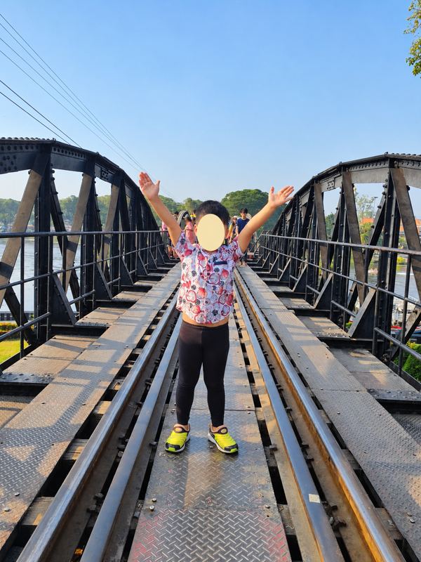 Kanchanaburi travel guide: My son on the River Kwai bridge