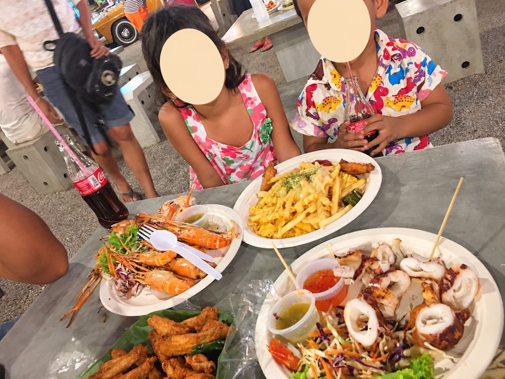 Hua Hin travel guide: My children sharing seafood at Tamarind Market