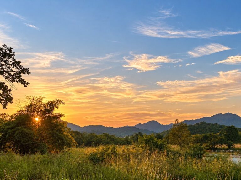 Khao Yai travel guide: sunset over wooded mountain hills